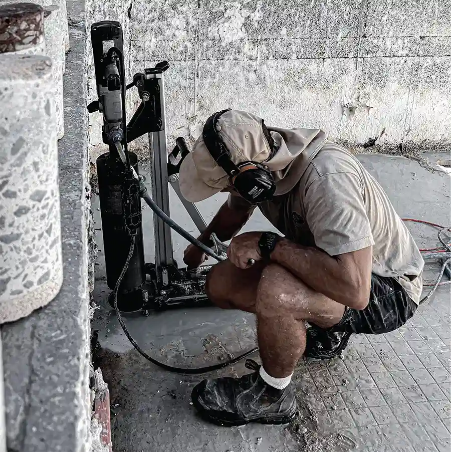 A Slice It Right staff working on concrete drilling for a Perth commercial project